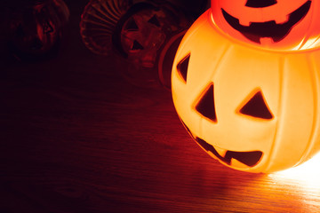 halloween holiday season greeting party with pumpkin lamp lantern on wood table