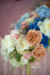 the most beautiful flowers, magnificent bouquets of flowers on the leg in the interior of the restaurant for a festive floristry store or wedding salon for the bride or groom, a bridal bouquet, butane