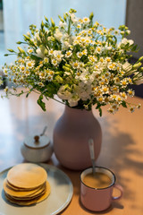 the most beautiful flowers, magnificent bouquets of flowers on the leg in the interior of the restaurant for a festive floristry store or wedding salon for the bride or groom, a bridal bouquet, butane