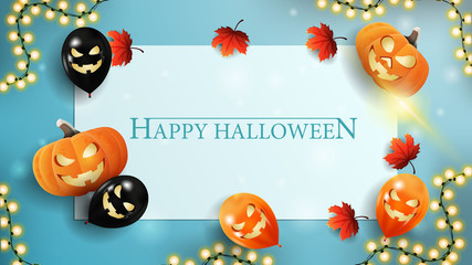 Halloween template for your creativity with paper sheet. blue template with Halloween balloons, pumpkins, autumn leaves and garland. The view from the top.