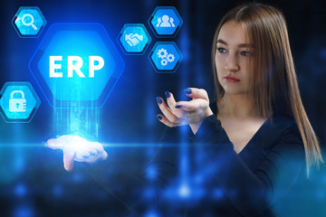 The concept of business, technology, the Internet and the network. A young entrepreneur working on a virtual screen of the future and sees the inscription: ERP