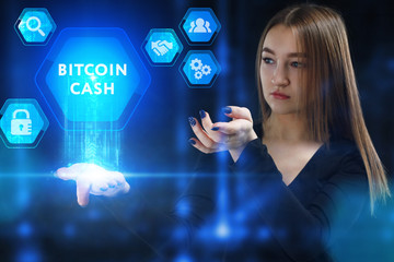 The concept of business, technology, the Internet and the network. A young entrepreneur working on a virtual screen of the future and sees the inscription: Bitcoin cash