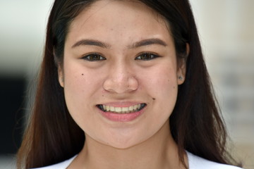 A Young Filipina Female Smiling