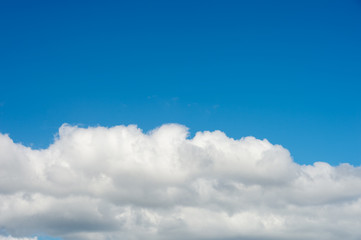 Naklejka na ściany i meble clouds on blue sky, nature cloudy background with copyspace