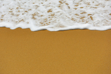 Soft wave on sandy beach texture background, happy summer holiday concept