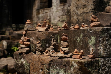 Fototapeta na wymiar Stone murals and sculptures in Angkor wat, Cambodia