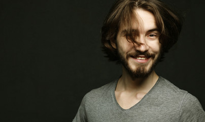 Fototapeta premium lifestyle and people concept:young man has excited expression, dresssed casually