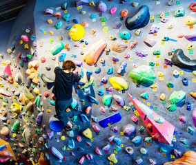 Lady and landscape of Bouldering climbing studio in Japan