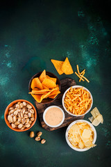 Beer snacks on wooden table