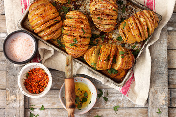 Baked potato with spices and garlic