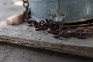 Closeup rusty chain in the countryside