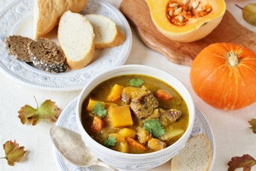 thick soup with pumpkin and beef. hearty autumn dish