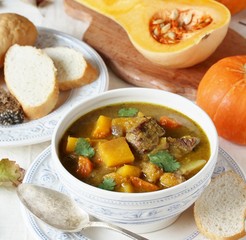 thick soup with pumpkin and beef. hearty autumn dish