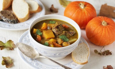 thick soup with pumpkin and beef. hearty autumn dish