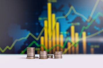 the coins stacked with a statistical chart on the back.