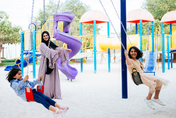 Arabian family spending time in a park