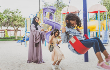 Arabian family spending time in a park