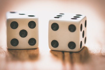 Two Dice on a Wooden Table