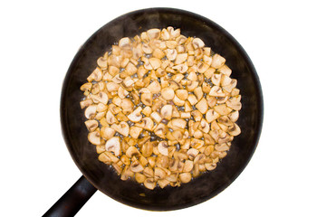 Fried mushrooms in a frying pan