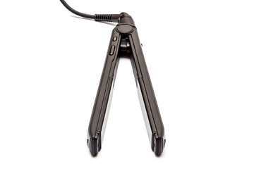 Hair straightener isolated on white