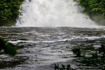 saale reservoir is overflowing and creates a 100 waterfall, very rare event, Saalburg, Thuringia,...