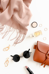 Fashion flatlay with women's cosmetics and accessories
