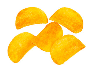 several potato chips with paprika isolated
