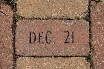 December 21 carved into stone