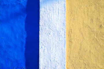 Vivid color bands: blue and light orange, painted surface, hard light.