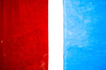 Vibrant vivid saturated color bands: blue, white and red.