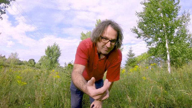 POV man trying to tell to an animal or kid to follow him.