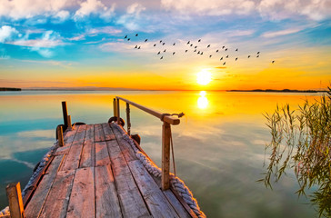 Obraz na płótnie Canvas dulce amanecer en el lago