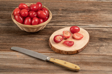fresh and ripe cranberry fruits on wooden table