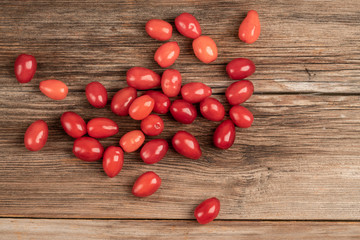 fresh and ripe cranberry fruits on wooden table