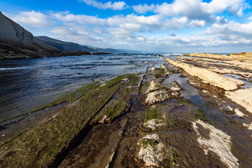 Close up of the flysch, a geological rock formations caused by the erosion of the sea in Basque Country Atlantic coast, Zumaia, Spain