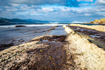 Close up of the flysch, a geological rock formations caused by the erosion of the sea in Basque Country Atlantic coast, Zumaia, Spain