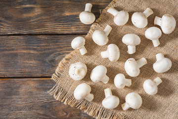 Mushrooms on a wooden table. Rustic style