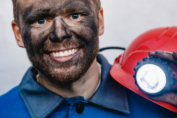 Miner after working on coal mine. Concept industrial engineer