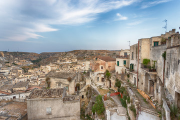 Fototapeta na wymiar Panoramic view of Matera (Sassi di Matera) with its steep ancient stone streets