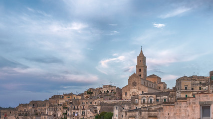 Obraz premium Panoramic view of Matera (Sassi di Matera) with its steep ancient stone streets