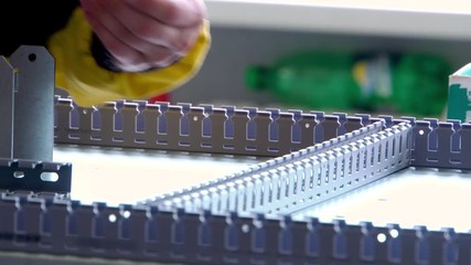 Drill screwdriver workflow creation of metal parts. male metal worker using drillpress. Close up