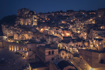 Obraz premium Panoramic view of Matera (Sassi di Matera) with its steep ancient stone streets