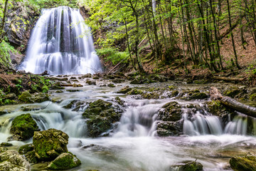 Fototapeta na wymiar Josefsthaler Wasserfälle - märchenhafter Wasserfall nahe dem Schliersee in Bayern