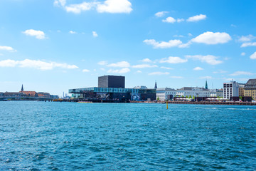 Fototapeta premium Beautiful architecture of Copenhagen on the canal. Cafe or Restaurant Ofelia. Bright sunny day. Architecture.