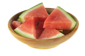 heap of fresh red  watermelon without seeds in wooden plate isolated on white background