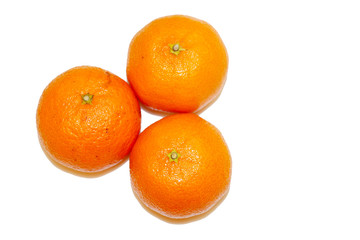Three mandarins isolated on white background and space for your text.