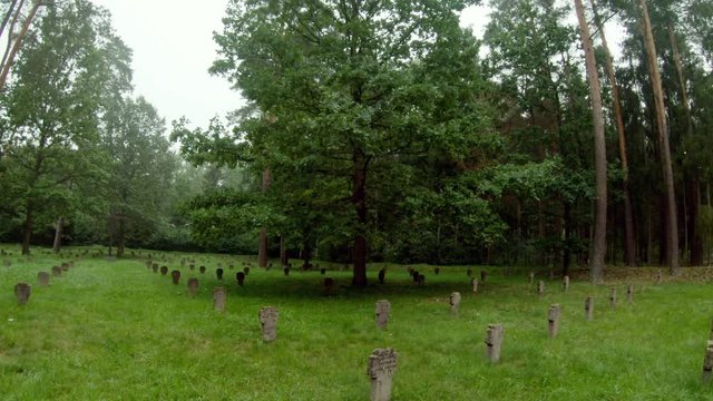 WWI German Soldiers And Victims Cemetery In The Forest. Moving Forward