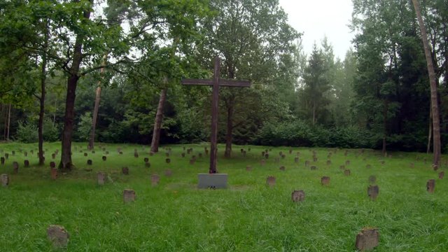 WWI German Soldiers And Victims Cemetery In The Forest. Moving Forward