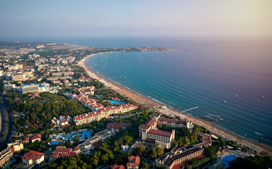 drone view of the beach with sun loungers