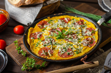 Omelette with salami and blue cheese
